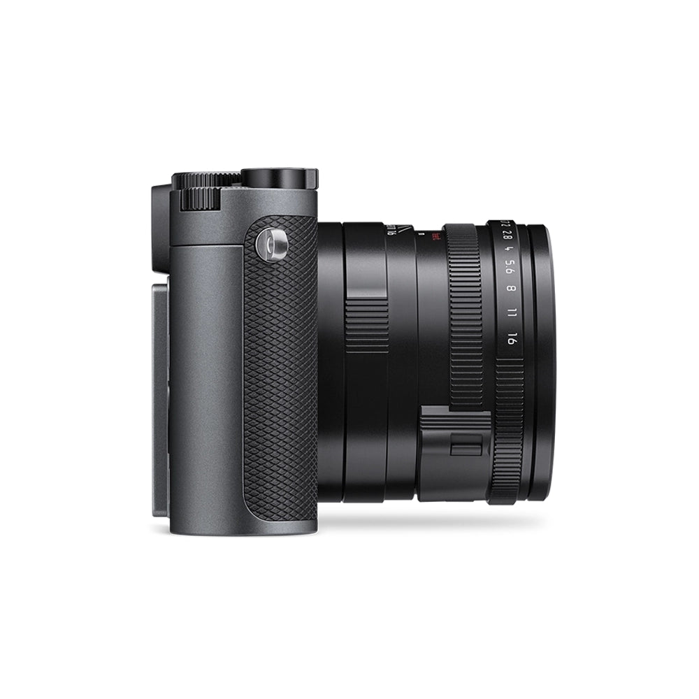 Black camera with lens on a white background