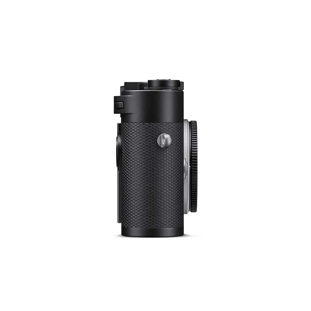 Black camera lens on a white background