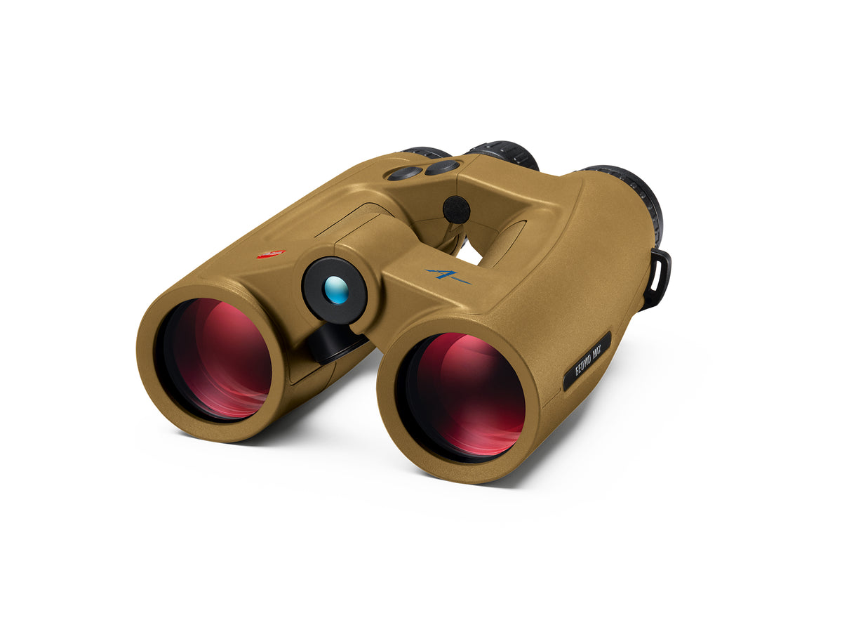 Tan binoculars with red lenses and black details, shown on a clean white background.